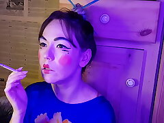 Japanese Stepsister Puffs on a Cigarette